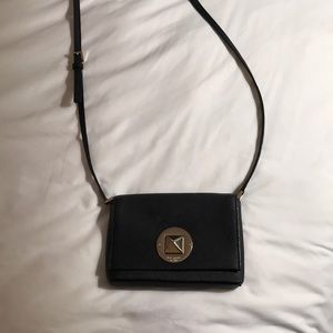 Black Kate spade cross body bag with gold hardware